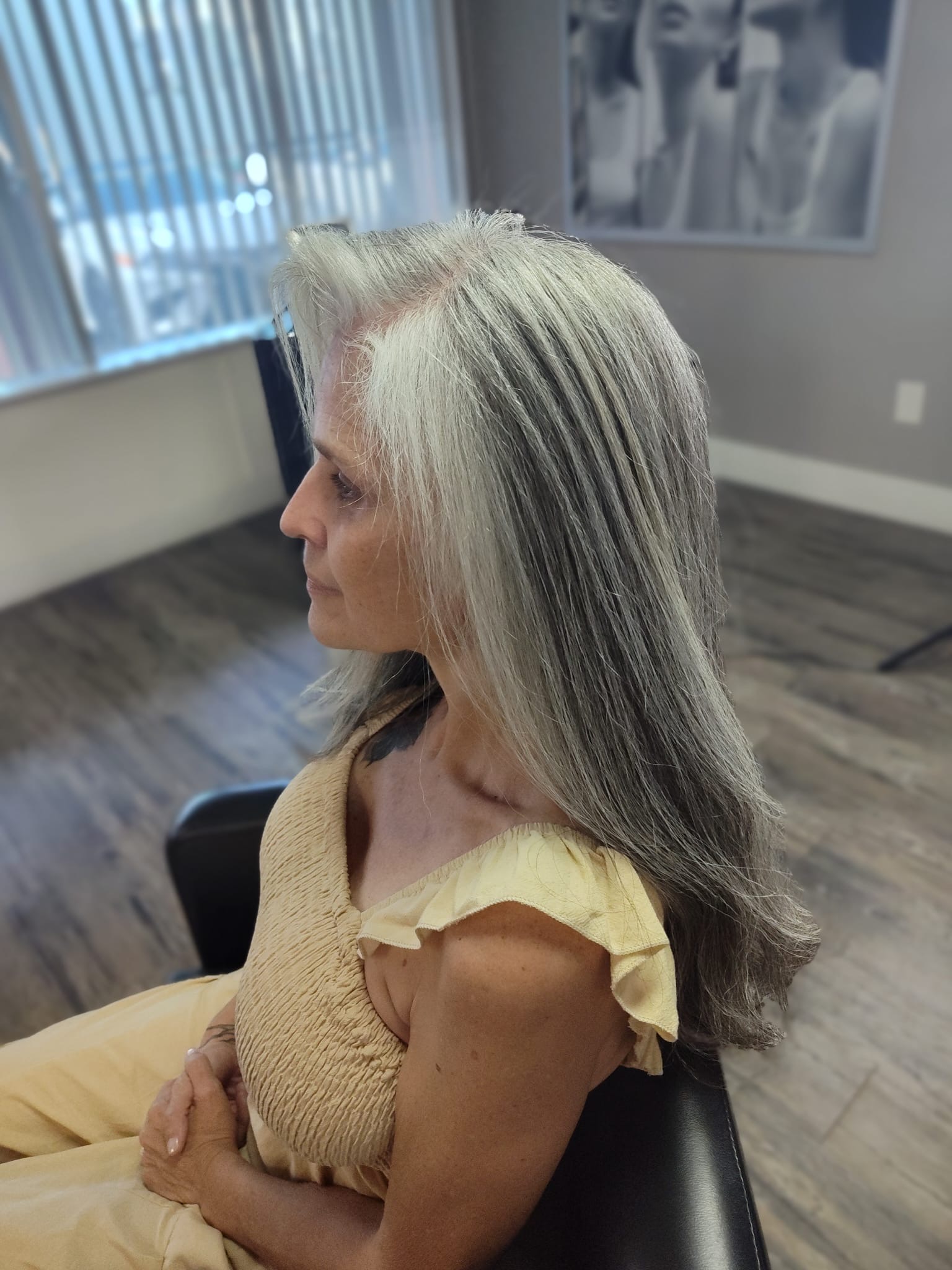 Real Distinct Hair Salon client with smooth, frizz-free hair after a keratin treatment
