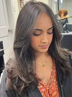 Elegant Long Layered Hairstyle with smooth curls and shine